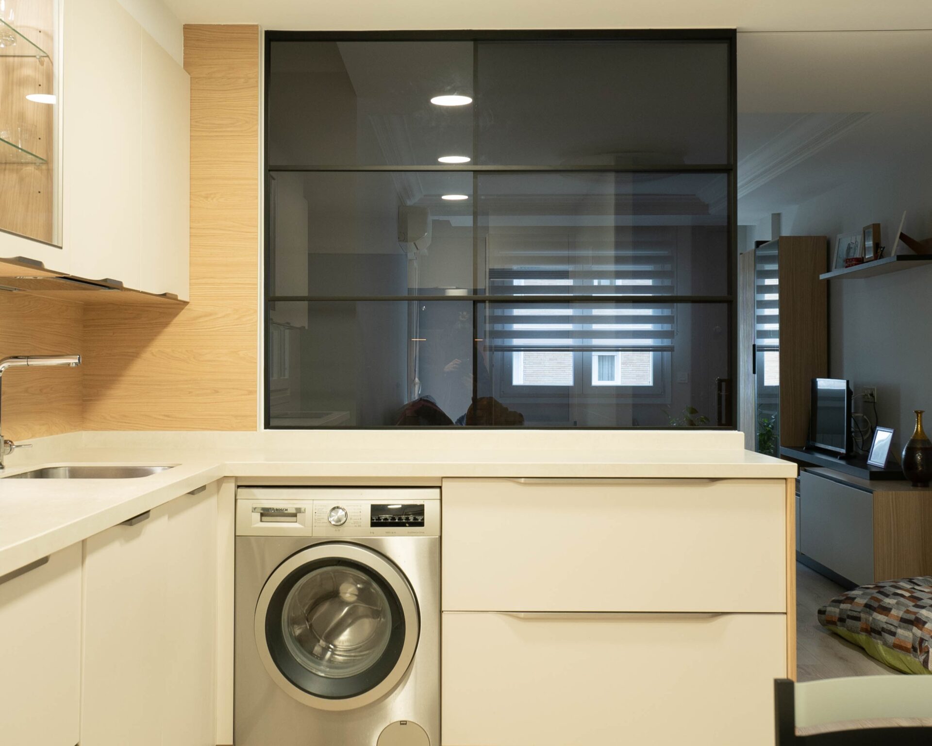 Separador de ambientes con cristal corredizo